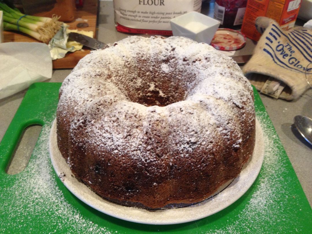 World's Best Apple Cake topped with Confectioner's SUgar